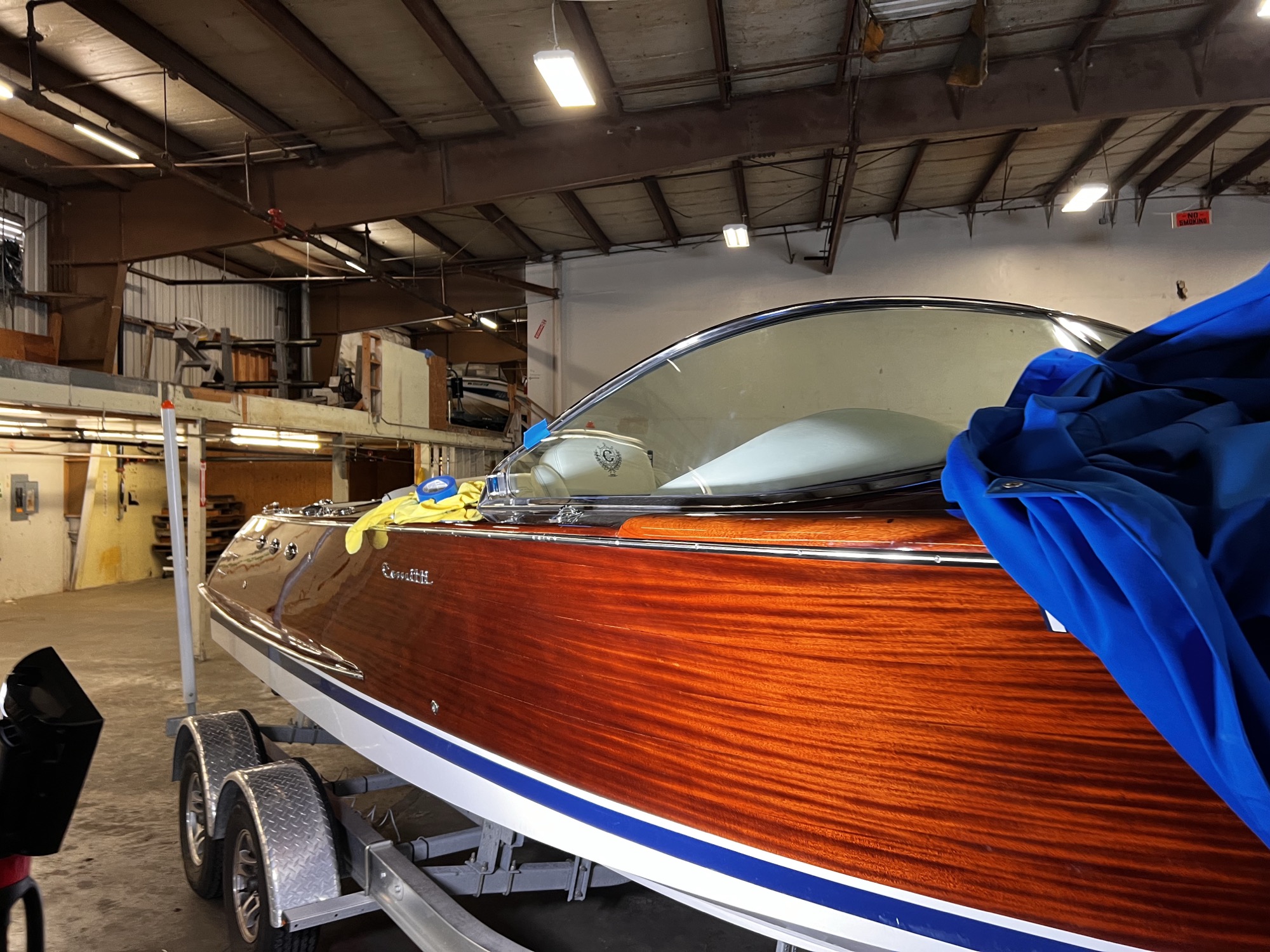 Classic mahogany speedboat with restored varnish and polished finish, Spokane Boat Detail