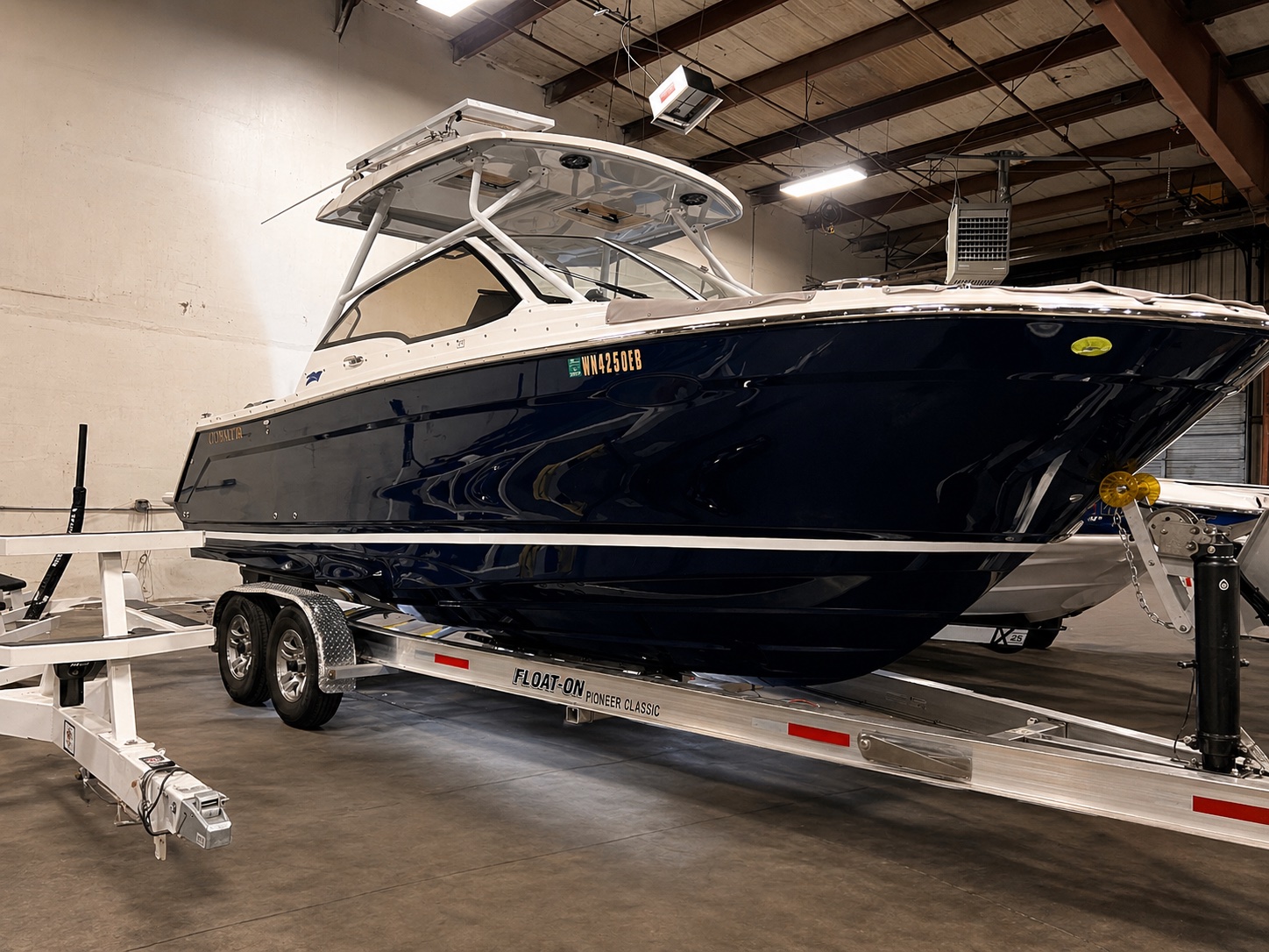 Dark blue Cobalt R6 with deep gloss finish after a full Spokane Boat Detail buff and wax
