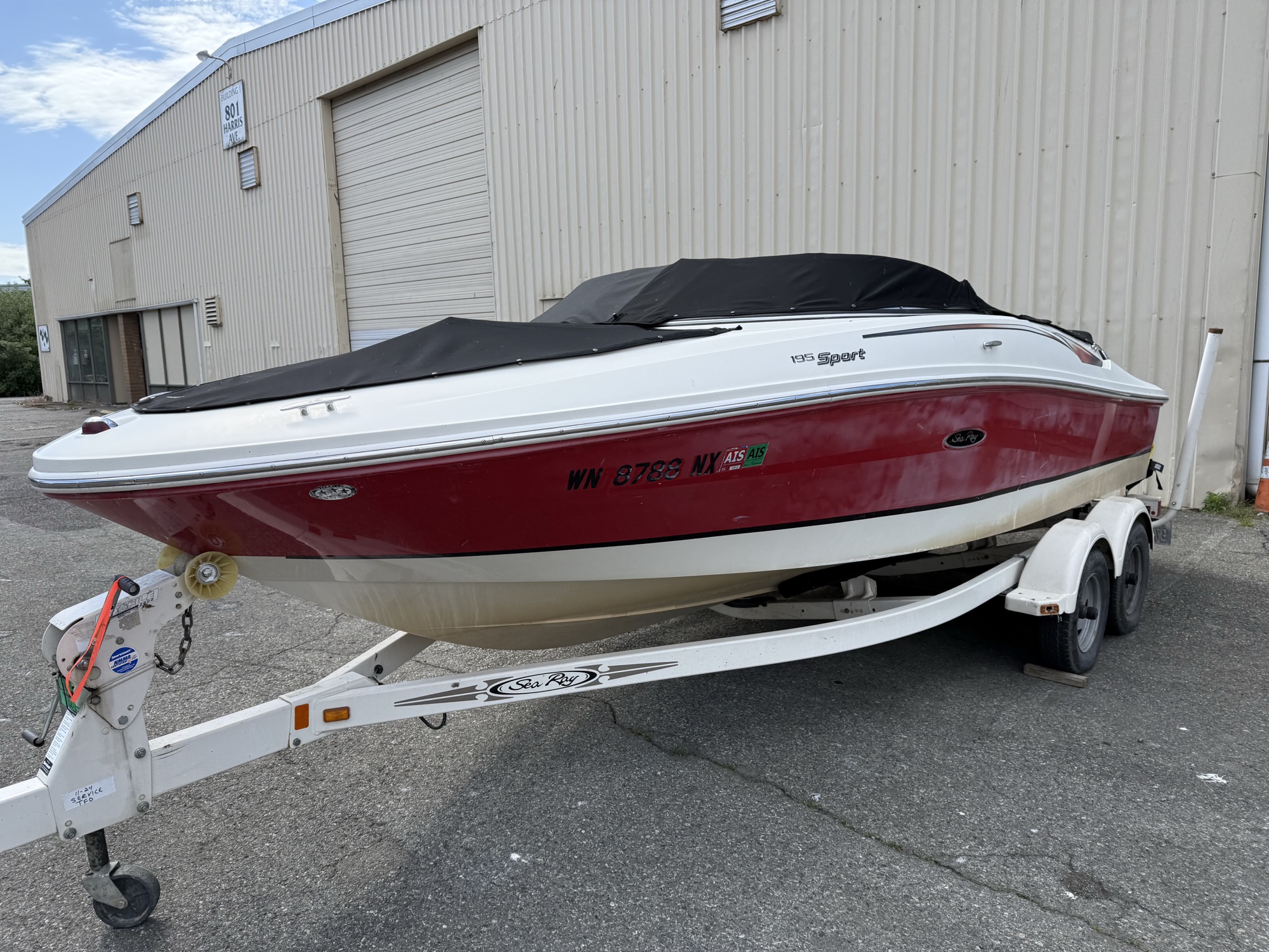 Sea Ray hull during a buff and wax service